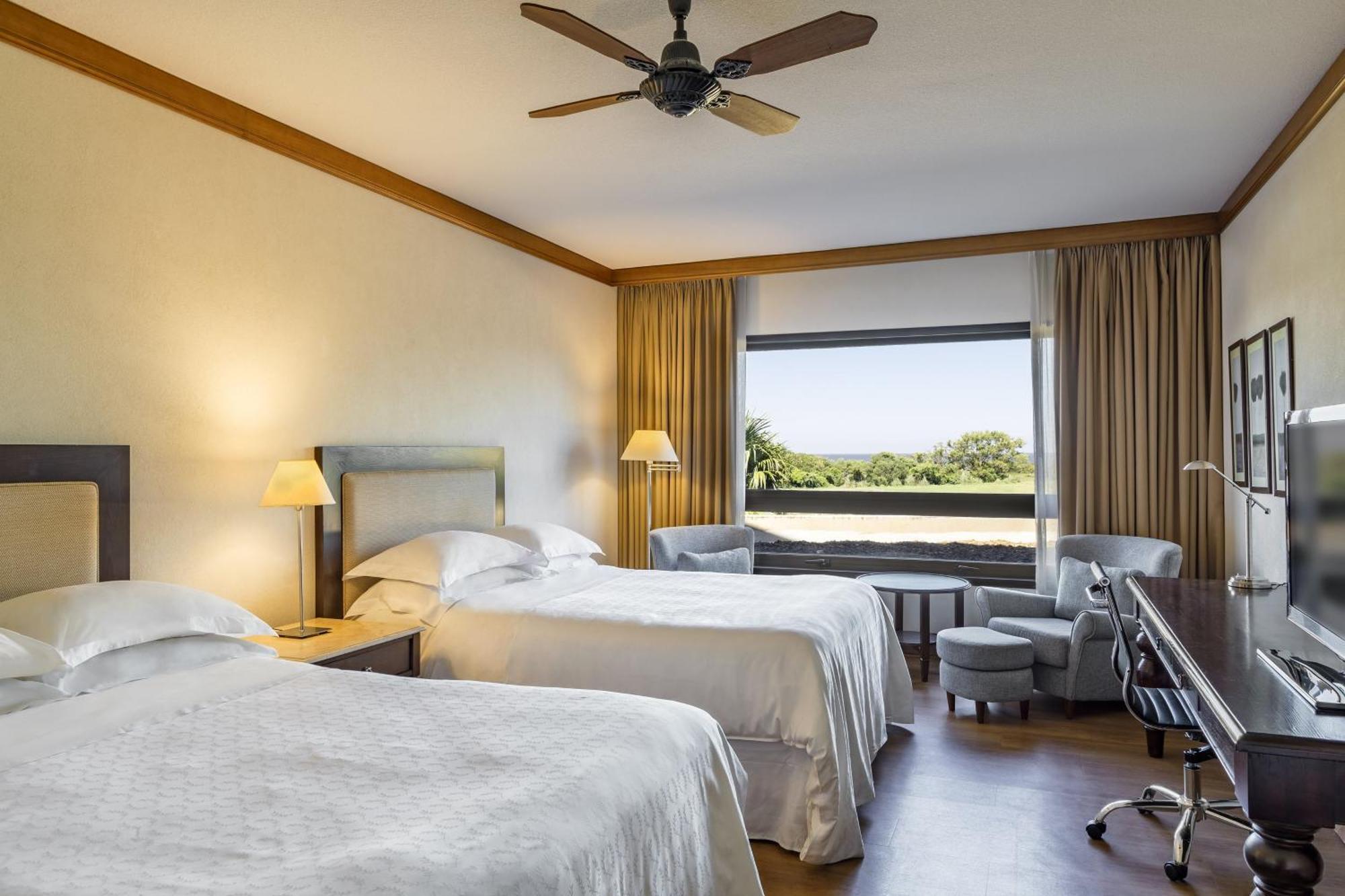 Sheraton Colonia Golf & Spa Resort Колония-дель-Сакраменто Экстерьер фото A room at the hotel